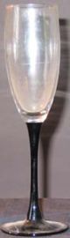 TWO FLUTED CHAMPAGNE GOBLETS- BLACK STEMS